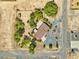 Overhead aerial view of a home featuring a circular driveway and desert landscaping at 291 E Hickory St, Pahrump, NV 89048