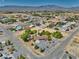 Scenic aerial view of a quiet residential area with mountain backdrop at 291 E Hickory St, Pahrump, NV 89048