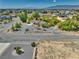 Aerial view of a single Gathering house with mature trees in a quiet neighborhood at 291 E Hickory St, Pahrump, NV 89048