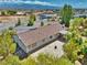 Charming backyard with a concrete patio, perfect for entertaining and relaxing, with mature trees at 291 E Hickory St, Pahrump, NV 89048