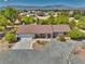 Lovely single-story house featuring a covered front porch, tidy landscaping, and a convenient two-car garage at 291 E Hickory St, Pahrump, NV 89048