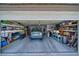 Spacious garage, featuring car, overhead storage, and plenty of room for storage at 291 E Hickory St, Pahrump, NV 89048
