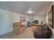 Inviting living room with a fireplace, plush seating, and natural light at 291 E Hickory St, Pahrump, NV 89048