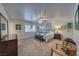 Spacious primary bedroom with ample natural light and a ceiling fan at 291 E Hickory St, Pahrump, NV 89048