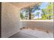 Private balcony with views of lush greenery, providing a tranquil outdoor retreat at 3150 Soft Breezes Dr # 1216, Las Vegas, NV 89128