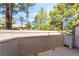 Balcony showcasing views of surrounding trees, perfect for relaxation and enjoying nature at 3150 Soft Breezes Dr # 1216, Las Vegas, NV 89128