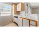 Kitchen with dishwasher, sink, and natural light from window at 3150 Soft Breezes Dr # 1216, Las Vegas, NV 89128