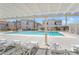 Inviting community pool with lounge chairs and shade structure offers a refreshing escape at 3150 Soft Breezes Dr # 1216, Las Vegas, NV 89128