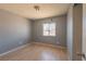 Cozy bedroom featuring natural light and hardwood floors at 321 Princess Ave, North Las Vegas, NV 89030