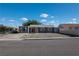 Quaint single-story home boasts a gray exterior with a concrete driveway and simple landscaping at 321 Princess Ave, North Las Vegas, NV 89030