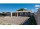 Modest single-story home featuring a gray exterior and zero landscaping at 321 Princess Ave, North Las Vegas, NV 89030