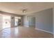 Bright living room area featuring hardwood floors and entry to home at 321 Princess Ave, North Las Vegas, NV 89030
