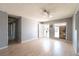 Bright and airy living room with light-colored flooring and fresh gray paint at 321 Princess Ave, North Las Vegas, NV 89030