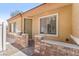 View of front entrance with brick and stone facade at 3521 Discovery Downs Ct, North Las Vegas, NV 89081