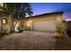 Cozy single-story home featuring a spacious two-car garage and a beautifully paved driveway at 3521 Discovery Downs Ct, North Las Vegas, NV 89081