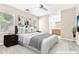 Staged bedroom with neutral paint, carpet, and natural light at 3521 Discovery Downs Ct, North Las Vegas, NV 89081