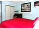 Bedroom featuring blue walls, closet, and comfortable bed at 3720 Desert Marina Dr # 33, Laughlin, NV 89029