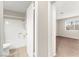 Attached bathroom features a shower-tub combination with tan tile flooring at 421 Carlin Ave, Las Vegas, NV 89110