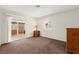 Bedroom featuring a sliding glass door, light neutral paint, and carpet flooring at 421 Carlin Ave, Las Vegas, NV 89110