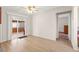 A living room featuring a sliding glass door and wood floors at 421 Carlin Ave, Las Vegas, NV 89110