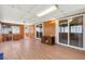 The sun room is enclosed with windows and has laminate flooring at 421 Carlin Ave, Las Vegas, NV 89110