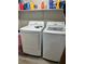Stacked washer and dryer in dedicated laundry area at 4363 Pittsfield St, Las Vegas, NV 89115