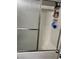 Shower with glass doors and a white tiled surround at 4363 Pittsfield St, Las Vegas, NV 89115