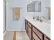 Bathroom featuring a double sink vanity with modern fixtures and ample counter space at 452 Waterwheel Falls Dr, Henderson, NV 89015