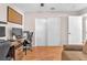 Home office featuring a work space with a couch and closet at 452 Waterwheel Falls Dr, Henderson, NV 89015