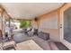 Covered patio space with outdoor seating, offering a relaxing and shaded retreat at 452 Waterwheel Falls Dr, Henderson, NV 89015