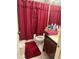 Bathroom with a shower tub combo, curtain, single sink vanity, and tile flooring at 5065 Celebrity Cir, Las Vegas, NV 89119