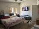 Bedroom featuring a bed, TV, blinds, and carpeted floors at 5065 Celebrity Cir, Las Vegas, NV 89119