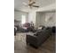 Cozy living room featuring hard surface floors, fireplace, and ample seating at 5065 Celebrity Cir, Las Vegas, NV 89119