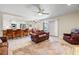 Spacious open living area, seamlessly connecting the kitchen with a comfortable living space at 5449 Desert Spring Rd, Las Vegas, NV 89149