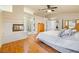 Main bedroom with vaulted ceiling, fireplace, and adjoining bathroom at 5449 Desert Spring Rd, Las Vegas, NV 89149