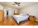 Main bedroom with hardwood floors, dresser, and natural light at 5449 Desert Spring Rd, Las Vegas, NV 89149