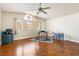 Spacious office features a large window, hardwood floors, a ceiling fan, and a work area at 5449 Desert Spring Rd, Las Vegas, NV 89149