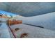 Backyard area with gravel, fence, and shade covering at 58 Pleasant Dale Dr, Henderson, NV 89074
