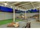 The backyard features a covered patio, dining area, seating, landscaping, and a relaxing atmosphere at 58 Pleasant Dale Dr, Henderson, NV 89074