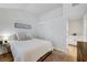 Bedroom with neutral palette, including closet and view to bathroom at 58 Pleasant Dale Dr, Henderson, NV 89074
