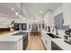 Modern kitchen featuring an island with cooktop and lots of counter space at 58 Pleasant Dale Dr, Henderson, NV 89074