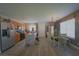 Bright open floor plan connecting the kitchen and dining area, ideal for Gathering gatherings and casual dining at 6002 Stone Hollow Ave, Las Vegas, NV 89156