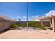 Private backyard with desert landscaping and clear blue skies at 6016 Bungalow Bay St, Las Vegas, NV 89130