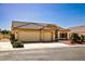 Charming home with a well-maintained yard and three-car garage at 6016 Bungalow Bay St, Las Vegas, NV 89130