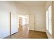 Open floor plan with vaulted ceilings and ample natural light from the window at 6016 Bungalow Bay St, Las Vegas, NV 89130