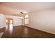 Large living room features wood flooring and bright natural light at 6016 Bungalow Bay St, Las Vegas, NV 89130