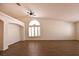 Spacious living room features wood flooring and bright natural light at 6016 Bungalow Bay St, Las Vegas, NV 89130