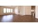 Inviting living room featuring wood floors and bright natural light at 6016 Bungalow Bay St, Las Vegas, NV 89130