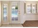 Door to outdoor patio with window shutters offering both privacy and sunlight to the interior at 6016 Bungalow Bay St, Las Vegas, NV 89130