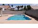 Inviting backyard pool with ample patio space and mature landscaping at 6016 Bungalow Bay St, Las Vegas, NV 89130